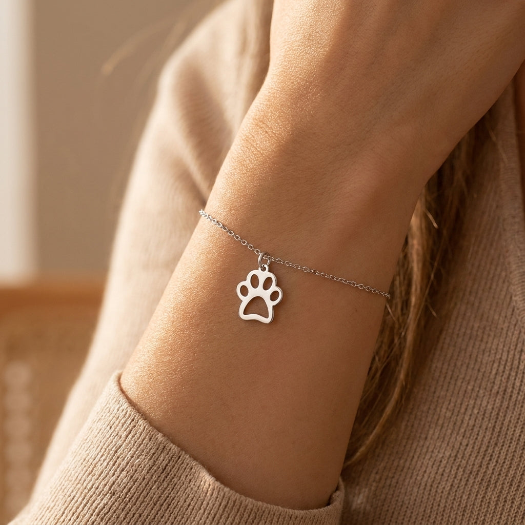 Opengewerkt dierenpootje charm