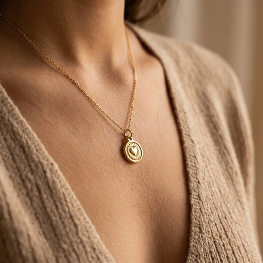 Munt met hart charm